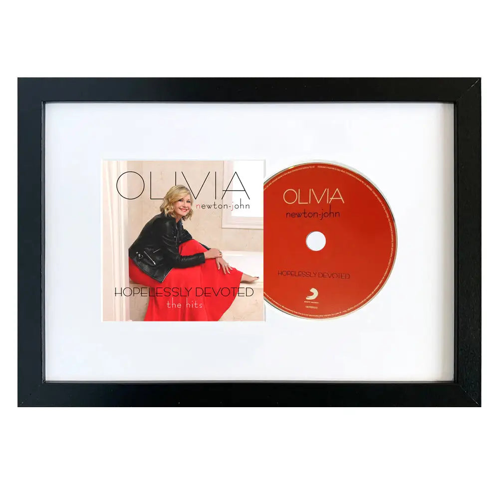 Olivia Newton-John-Hopelessly Devoted - The Hits CD Framed Album Art - Home & Garden > Wall Art