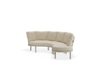 Beige curved sofa on a white background