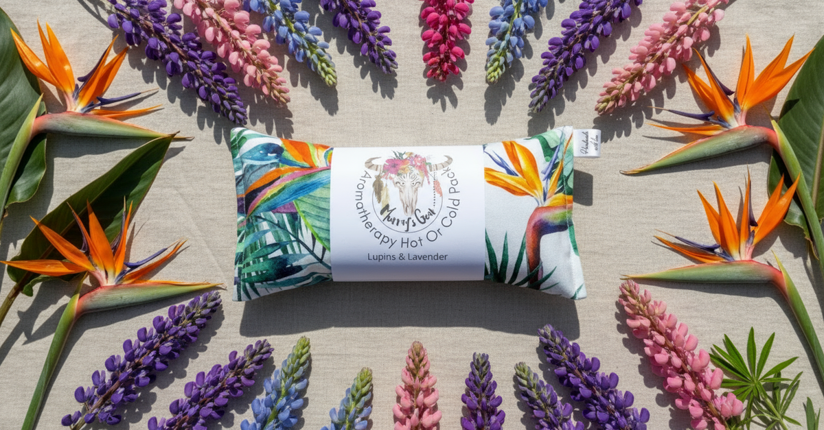 Hot and cold pack with colourful design surrounded by flowers on a textured surface