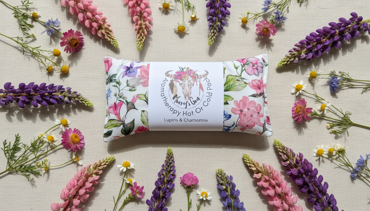 Heat pack with floral design surrounded by colourful flowers on a beige background