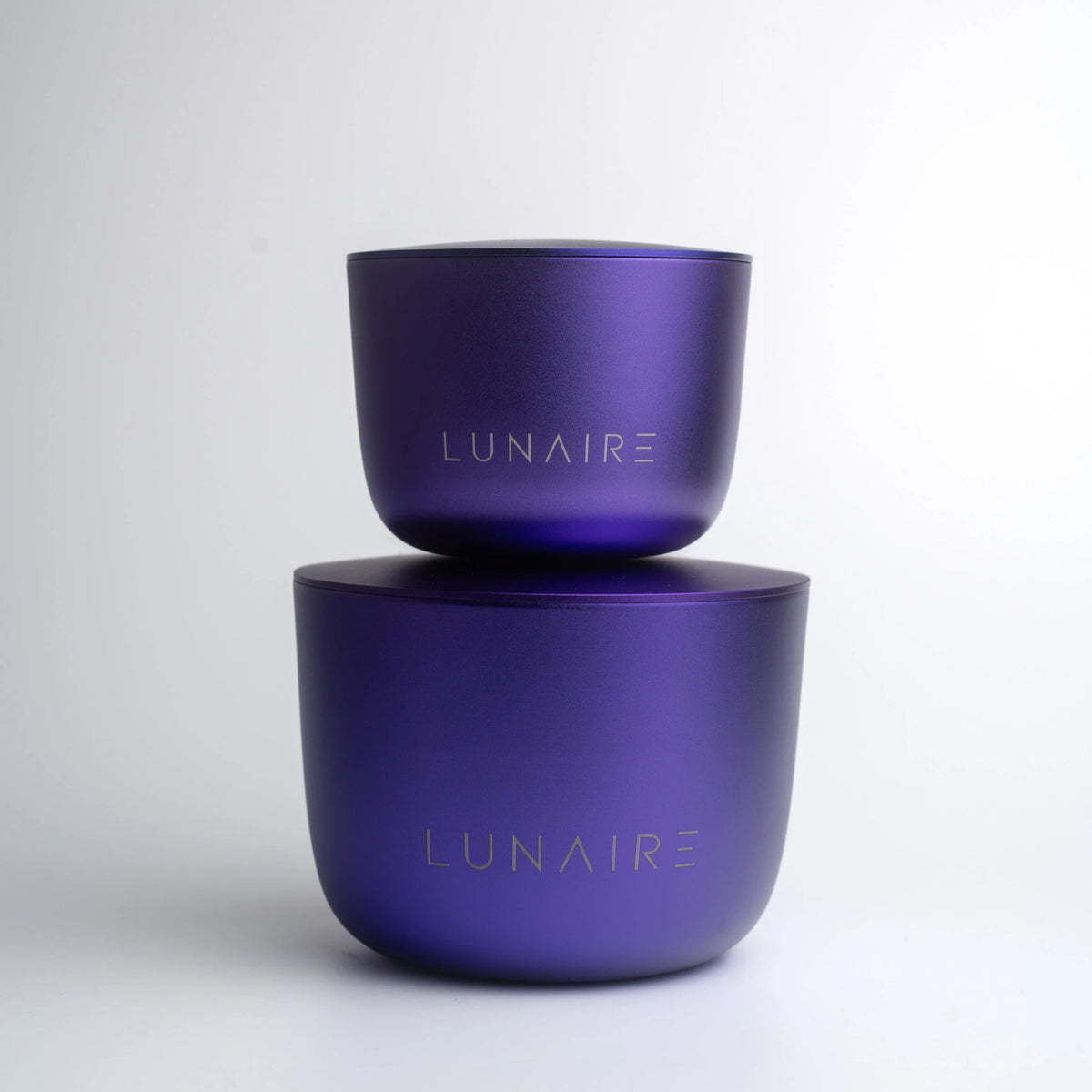 Two purple containers with 'LUNAIRE' branding on a white background