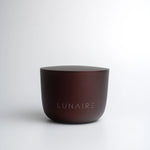 Brown ceramic cup with 'LUNAIRE' branding on a white background