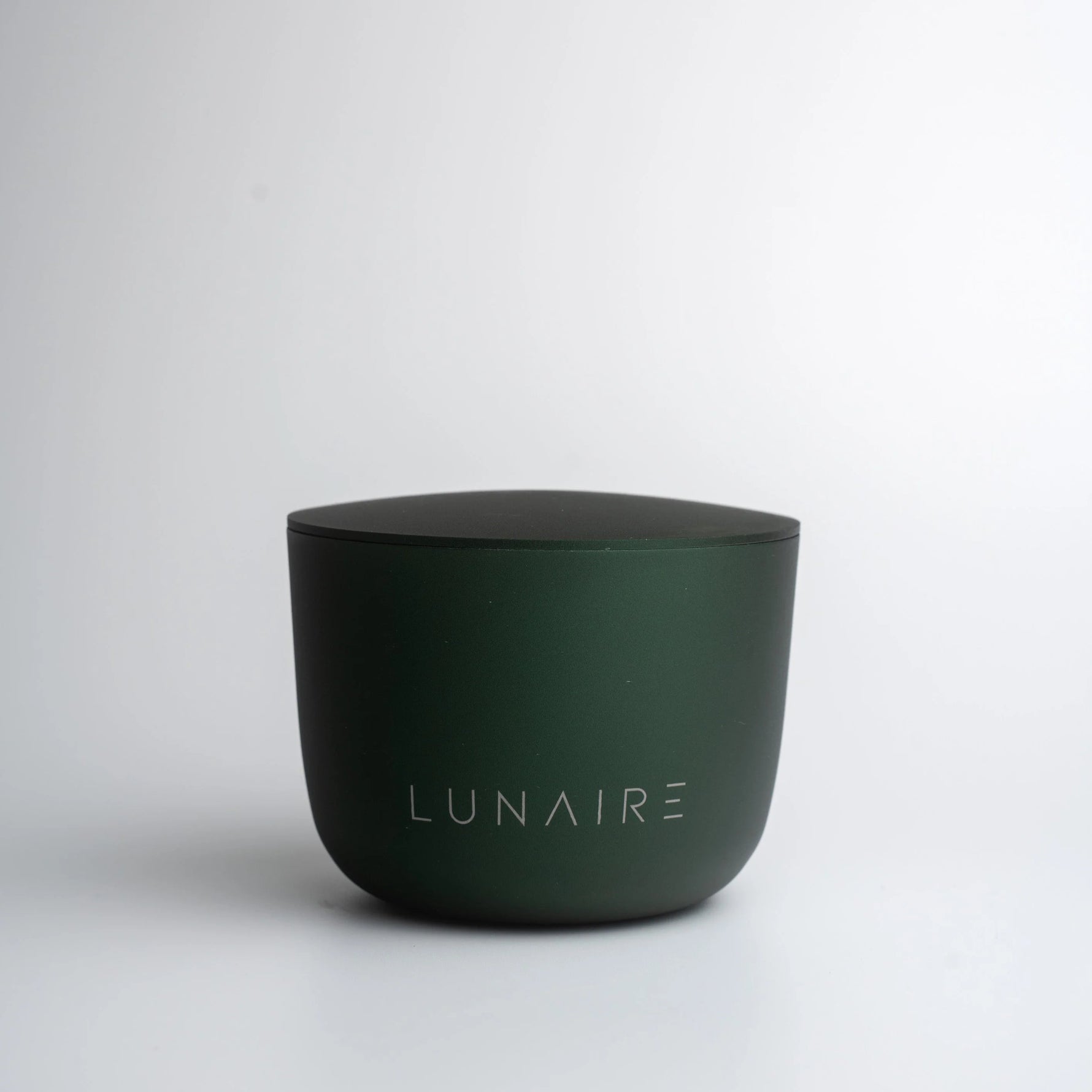 Dark green container with 'LUNAIRE' branding on a white background