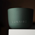 Green container with 'LUNAIRE' branding on a dark background