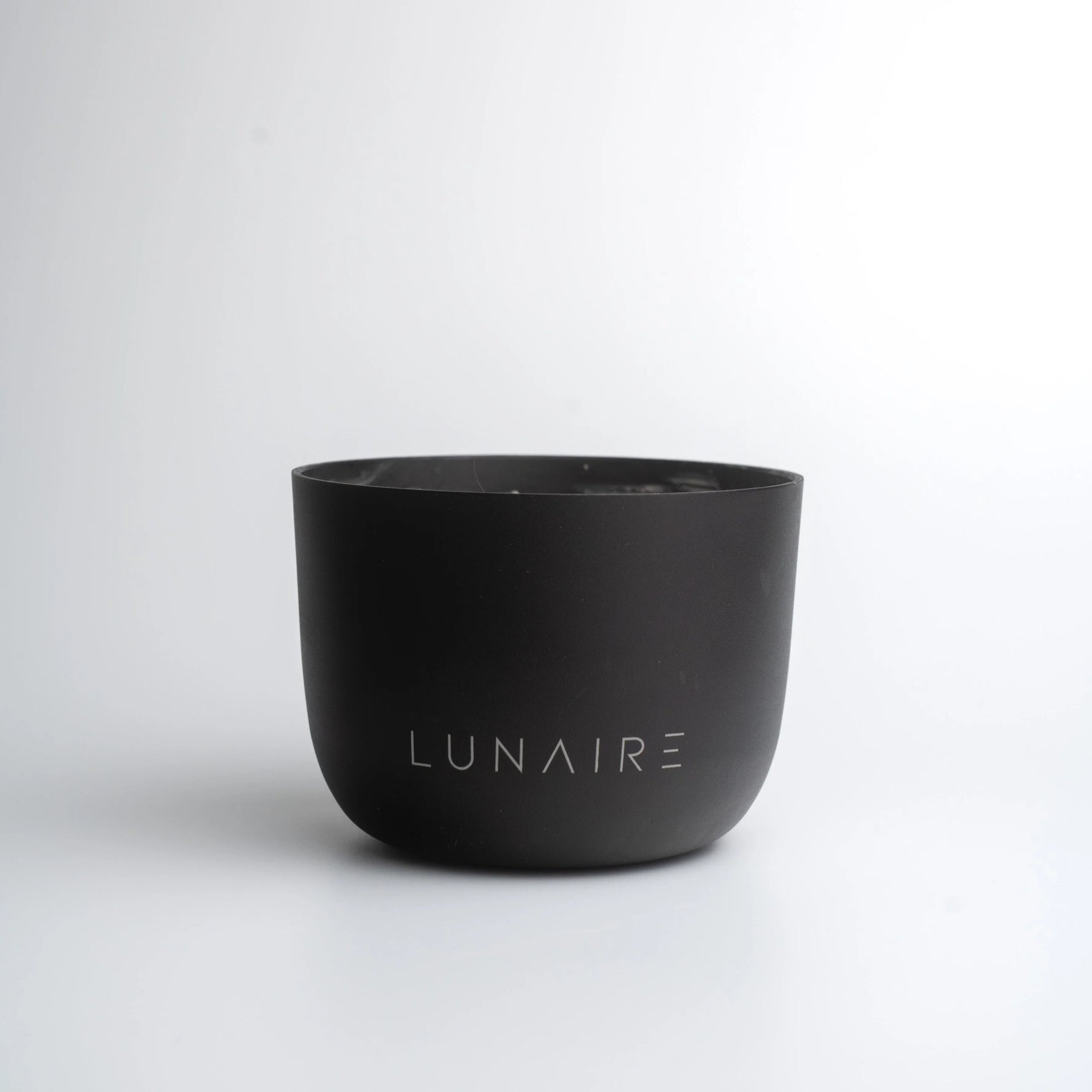 Black planter with 'LUNAIRE' branding on a white background