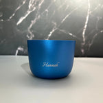 Blue cup with 'Hannah' engraving on a marble background