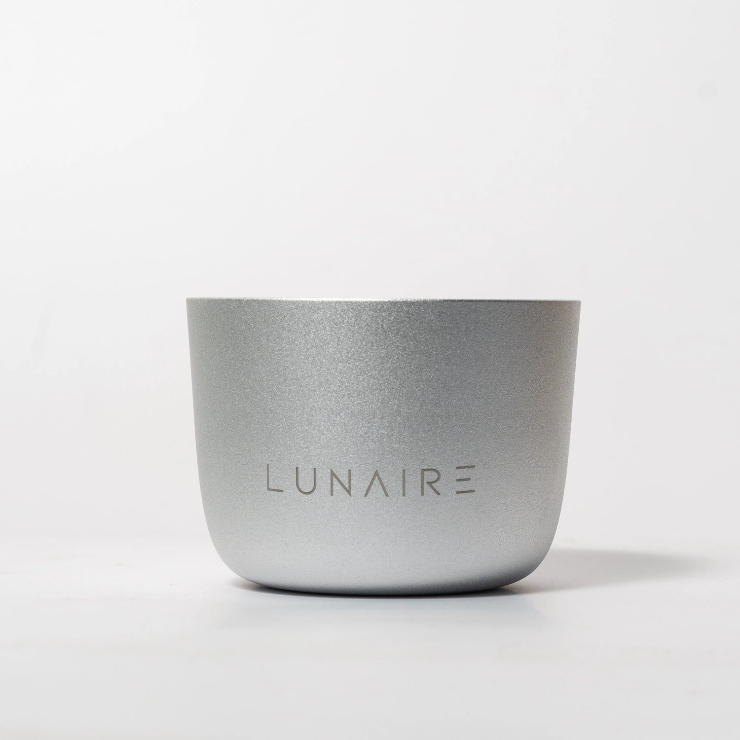 Silver cup with 'LUNAIRE' branding on a white background