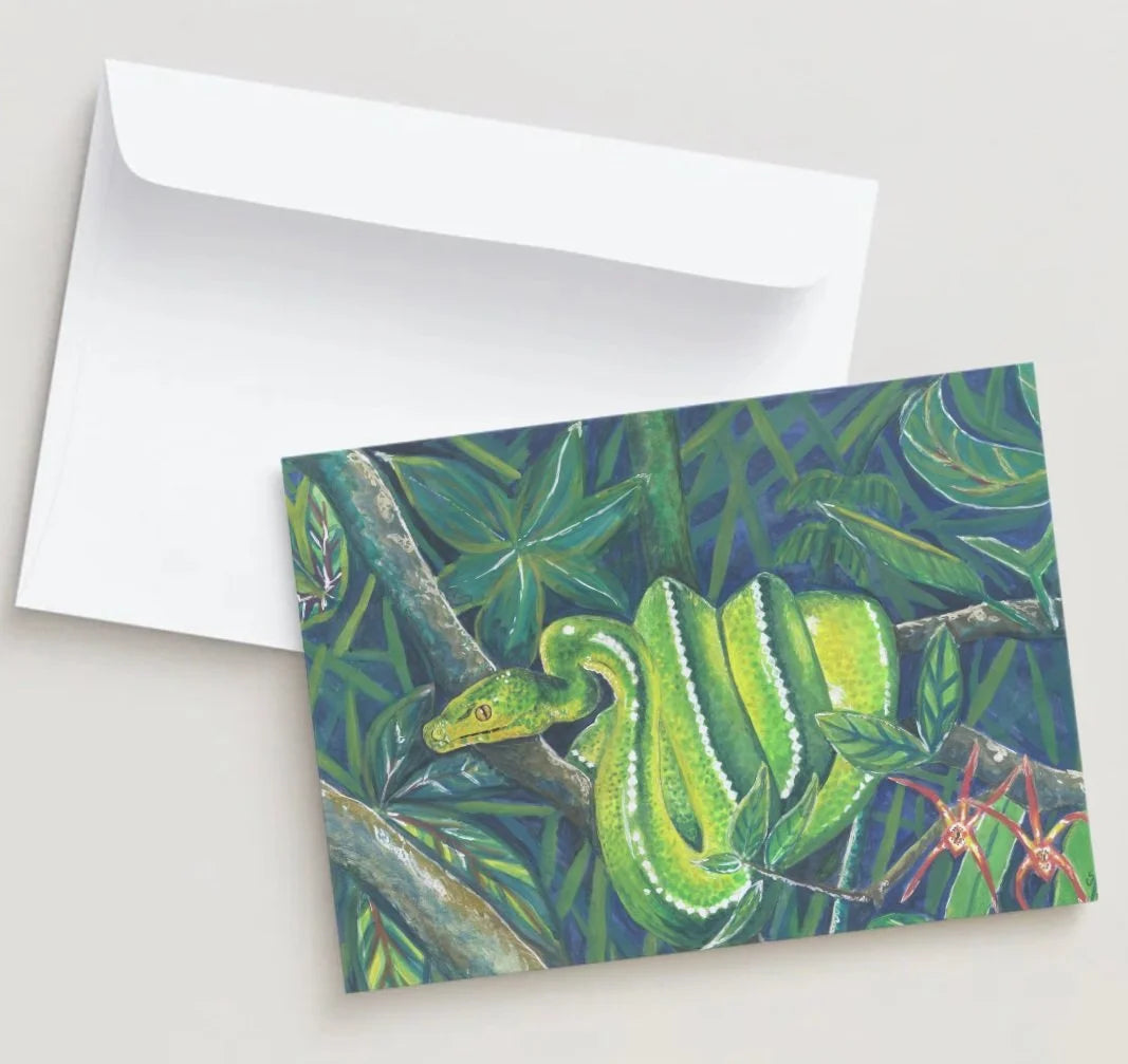 Greeting card with a green snake design on a white background