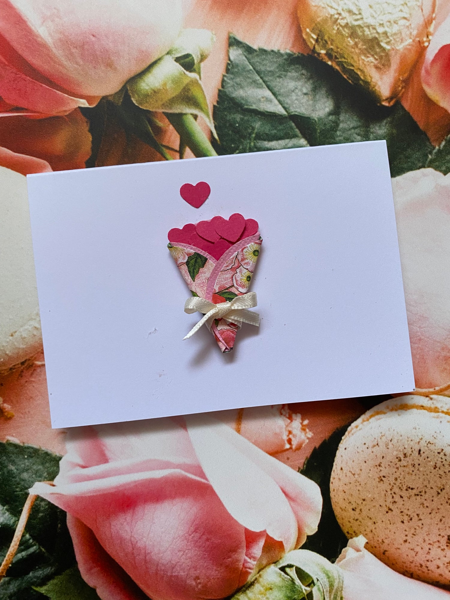 Card with floral design on a floral background