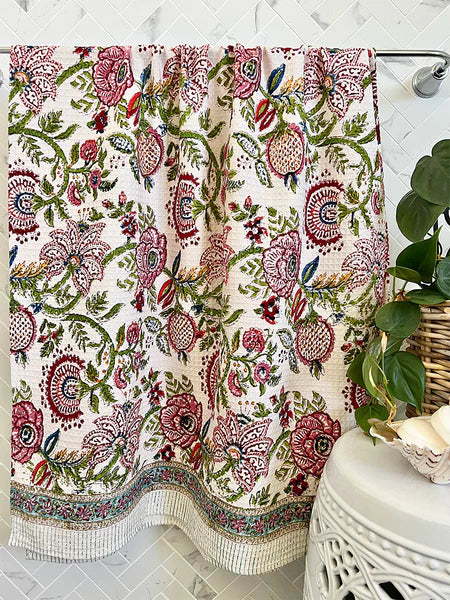 Decorative shower curtain with floral pattern in a bathroom setting