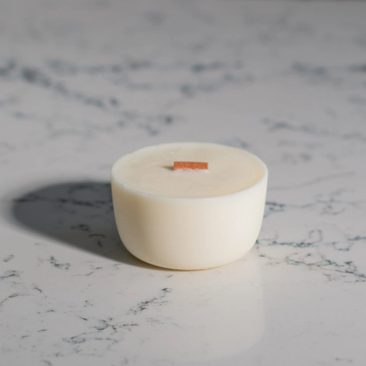 White ceramic bowl on a marble surface