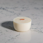 White ceramic bowl on a marble surface