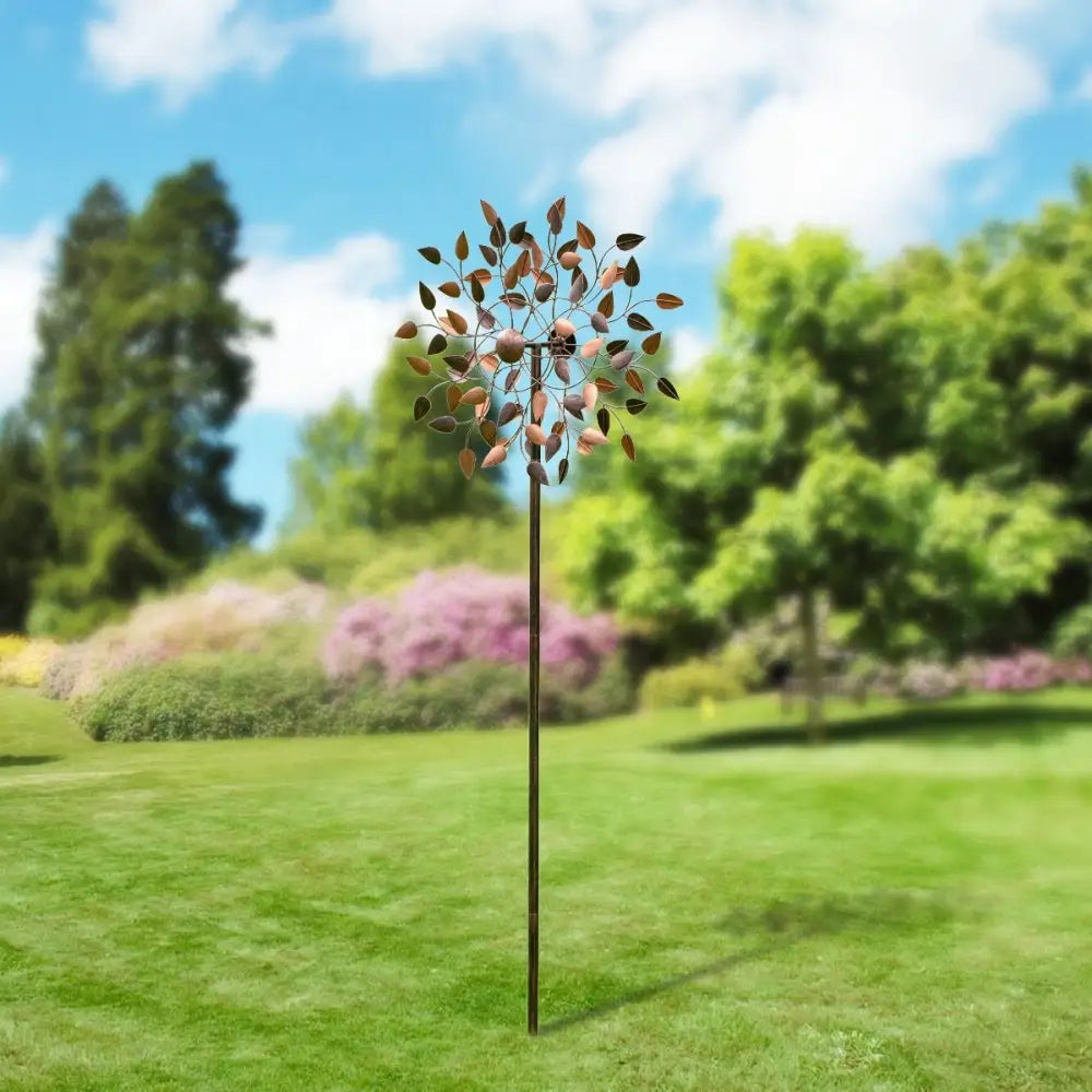 Autumn Wind Spinner featuring a metal design with leaf-shaped blades in a tree pattern