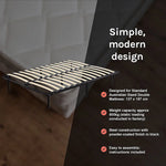 Metal bed frame with wooden slats in black finish for a modern minimalist bedroom