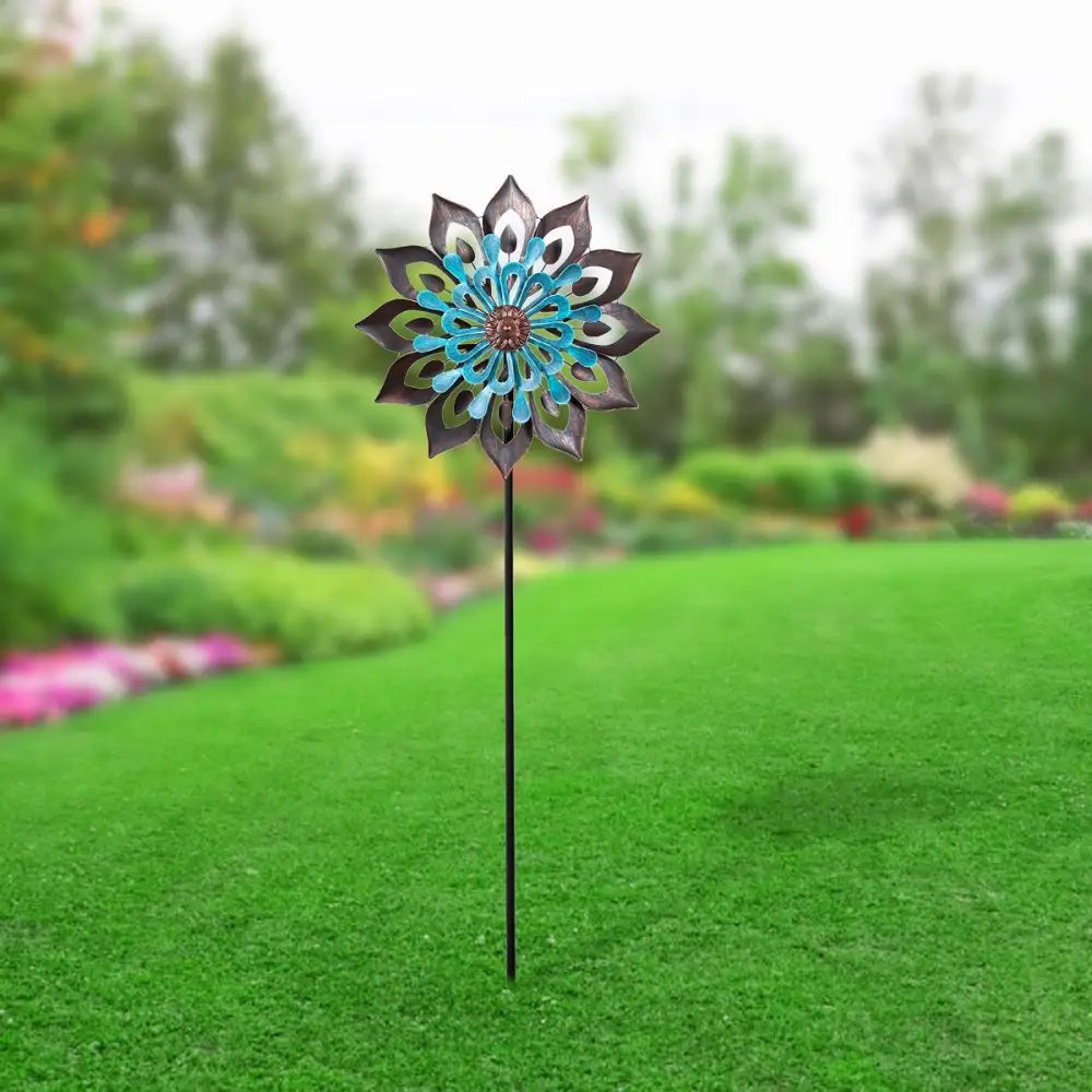 Metallic turquoise and bronze wind spinner designed as an Iris flower wind spinner