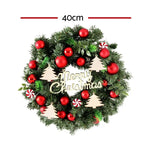 Festive Jingle Jollys Christmas Wreath with red baubles and wooden trees decor