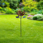 Lotus Wind Spinner featuring decorative metal blades and floral design elements