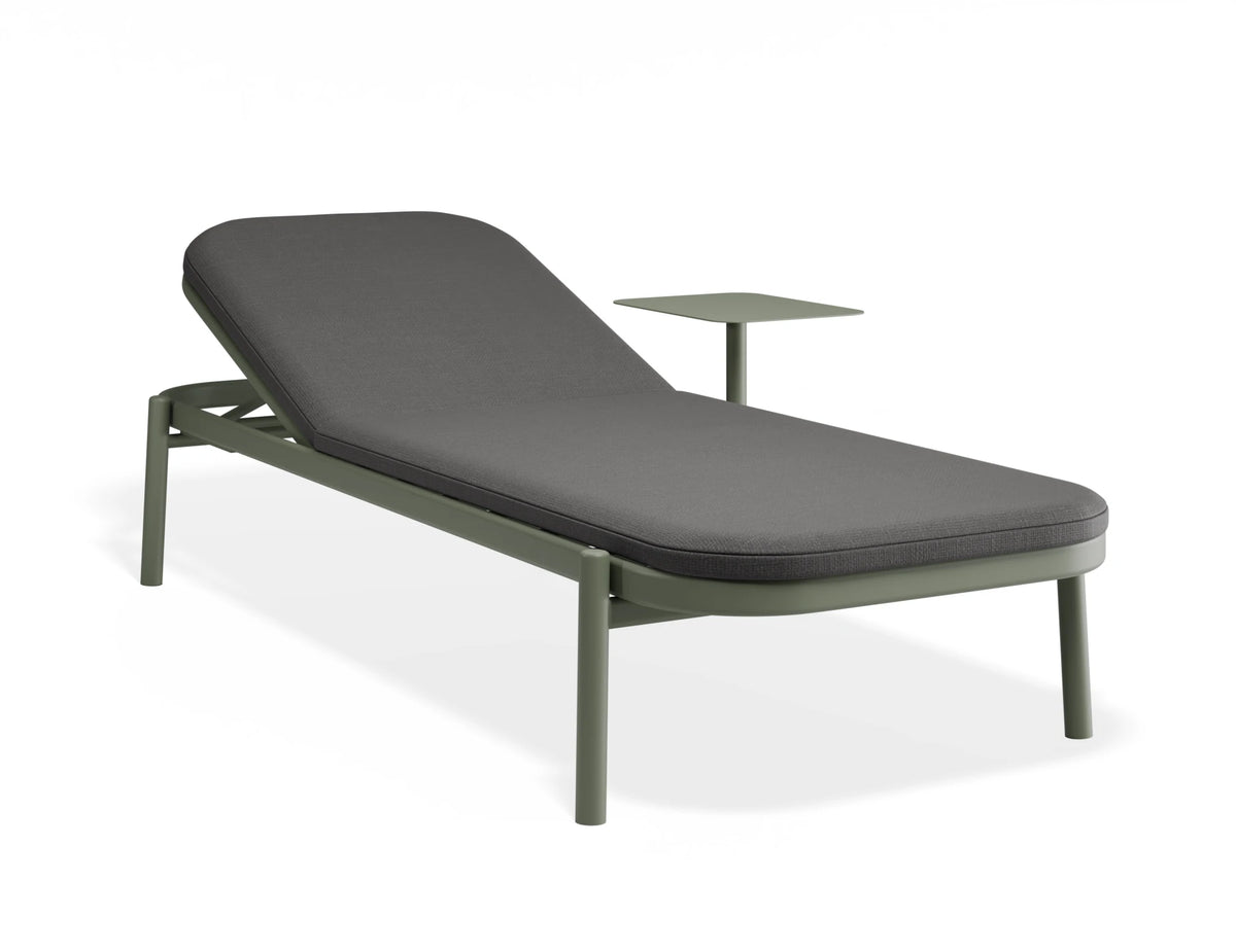 A modern outdoor chaise lounge chair with a dark gray cushioned seat and backrest, supported by an olive green metal frame with integrated legs and a matching side table, shown on a white background.