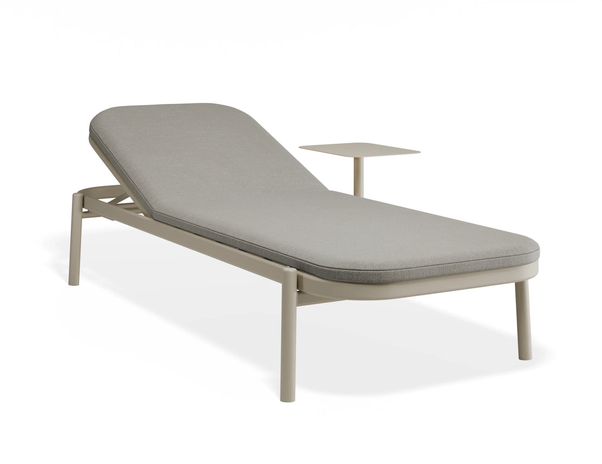 A modern outdoor chaise lounge chair with a light gray cushioned seat and backrest, supported by a light beige metal frame with integrated legs and a matching side table, shown on a white background.