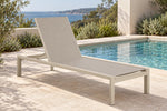 Nerano latte sun lounge beside a pool