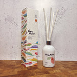 Clare Makes 200ml reed diffuser in a gloss white glass bottle with silver collar and white reeds