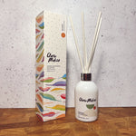 Clare Makes 200ml reed diffuser in a gloss white glass bottle with silver collar and white reeds