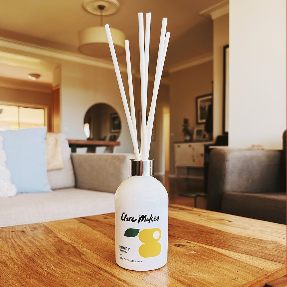 Clare Makes 200ml reed diffuser in a gloss white glass bottle with silver collar and white reeds