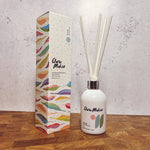 Clare Makes 200ml reed diffuser in a gloss white glass bottle with silver collar and white reeds