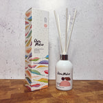Clare Makes 200ml reed diffuser in a gloss white glass bottle with silver collar and white reeds