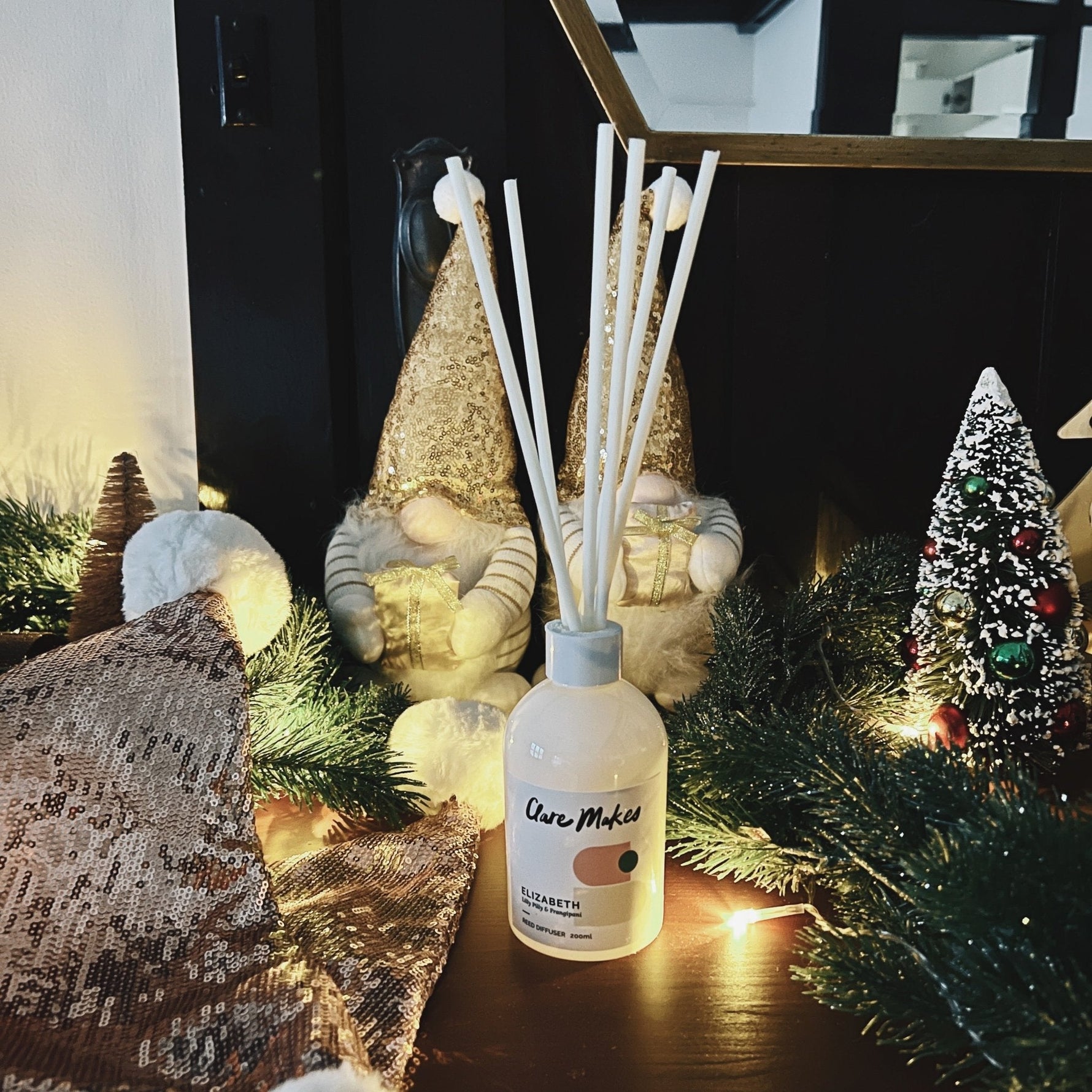 Clare Makes 200ml reed diffuser in a gloss white glass bottle with silver collar and white reeds
