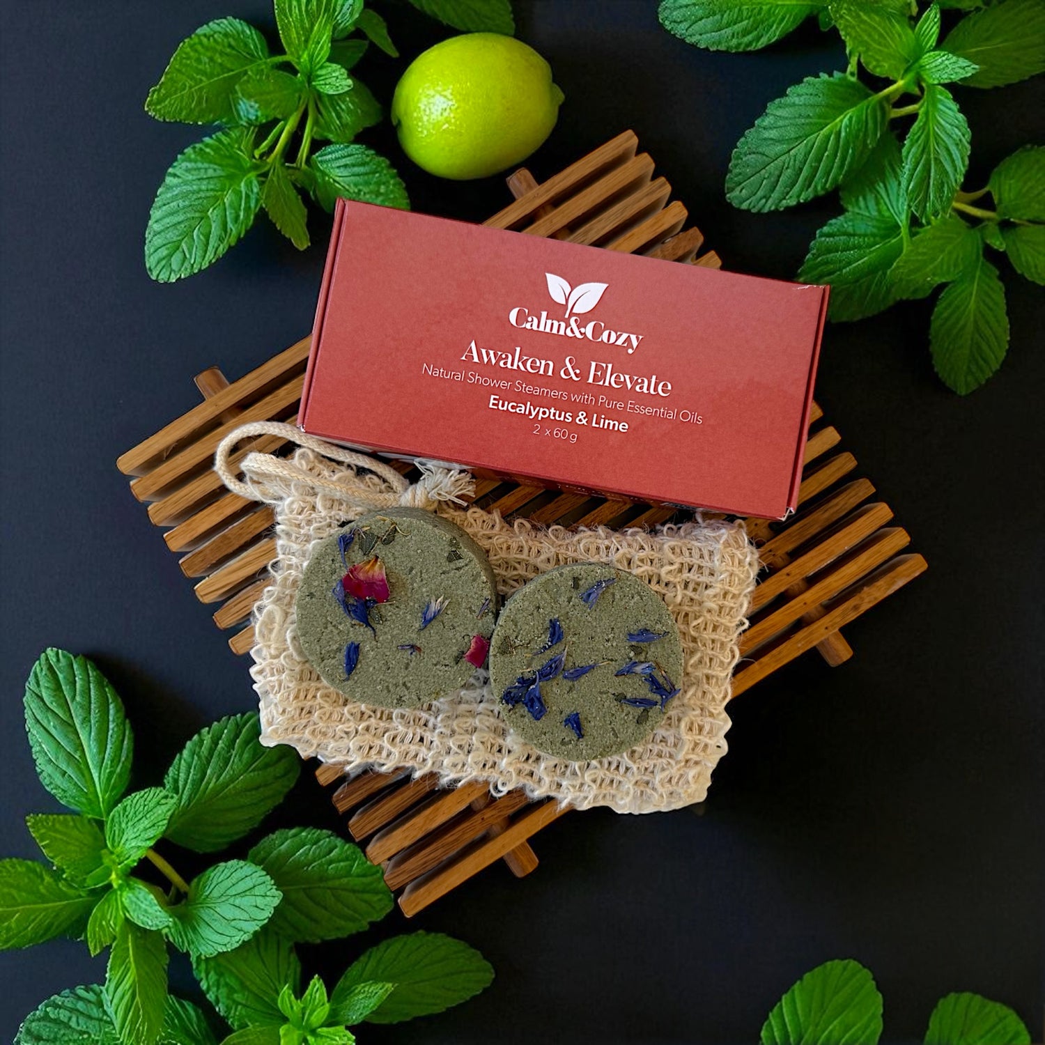 Calm & Cozy product packaging with natural items on a dark background