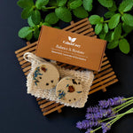 Calm & Cozy Balance & Restore product with decorative soap and lavender on a dark background