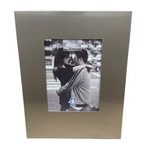 Metallic aluminium photo frame showcasing a black and white romantic photograph